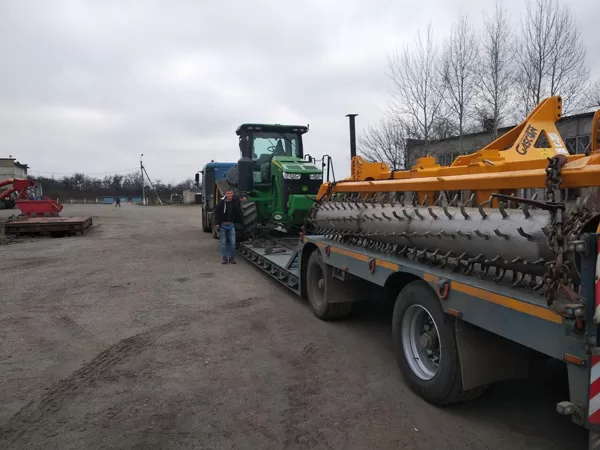 JD 8360RT & Gascon subsoiler delivered from UK & Spain to farm in Ukraine